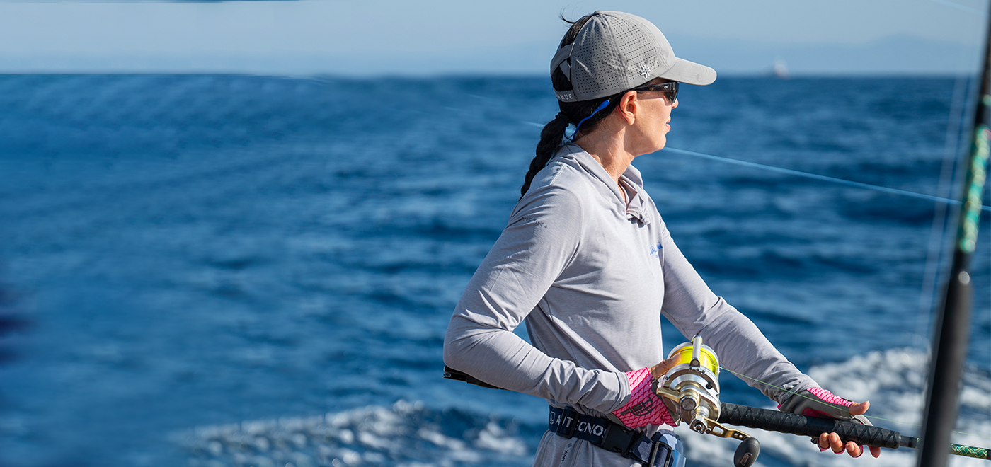 Woman fishing wearing Hook Polarized Sunglasses