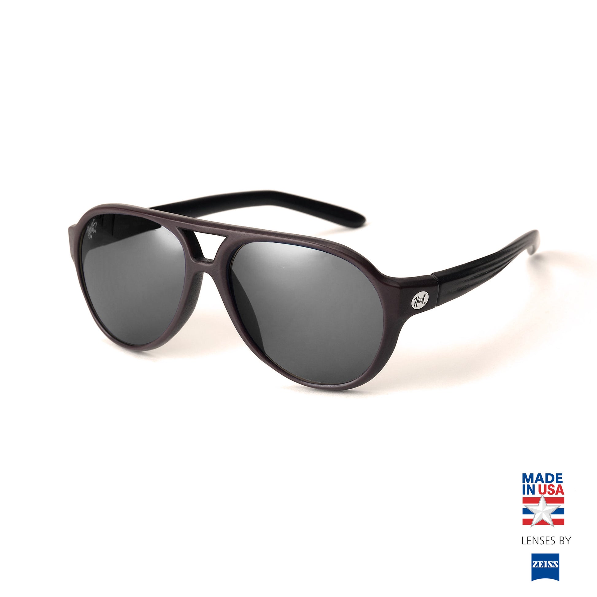 PATRIOT - Black sunglasses with blue lenses on a white background, featuring 'Made in USA' and Zeiss branding by hook optics
