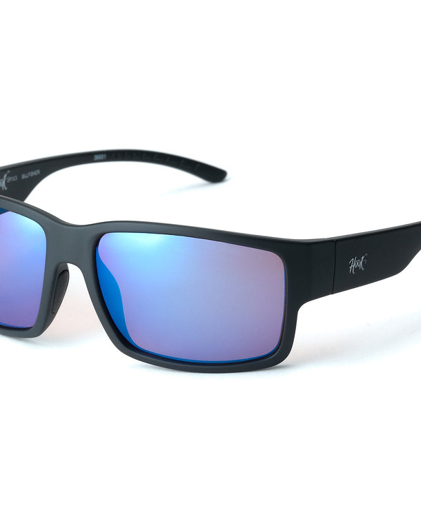 Offshore angler wearing Billfisher polarized sunglasses for clear fish spotting.