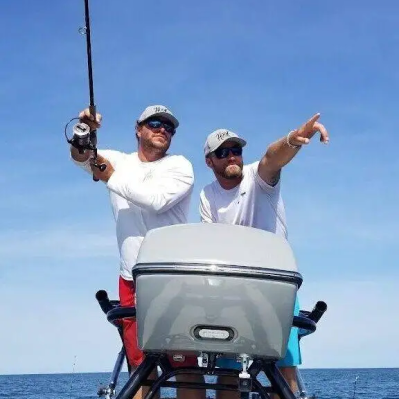 Two fishermen on a boat wearing Hook Polarized Fishing Sunglasses